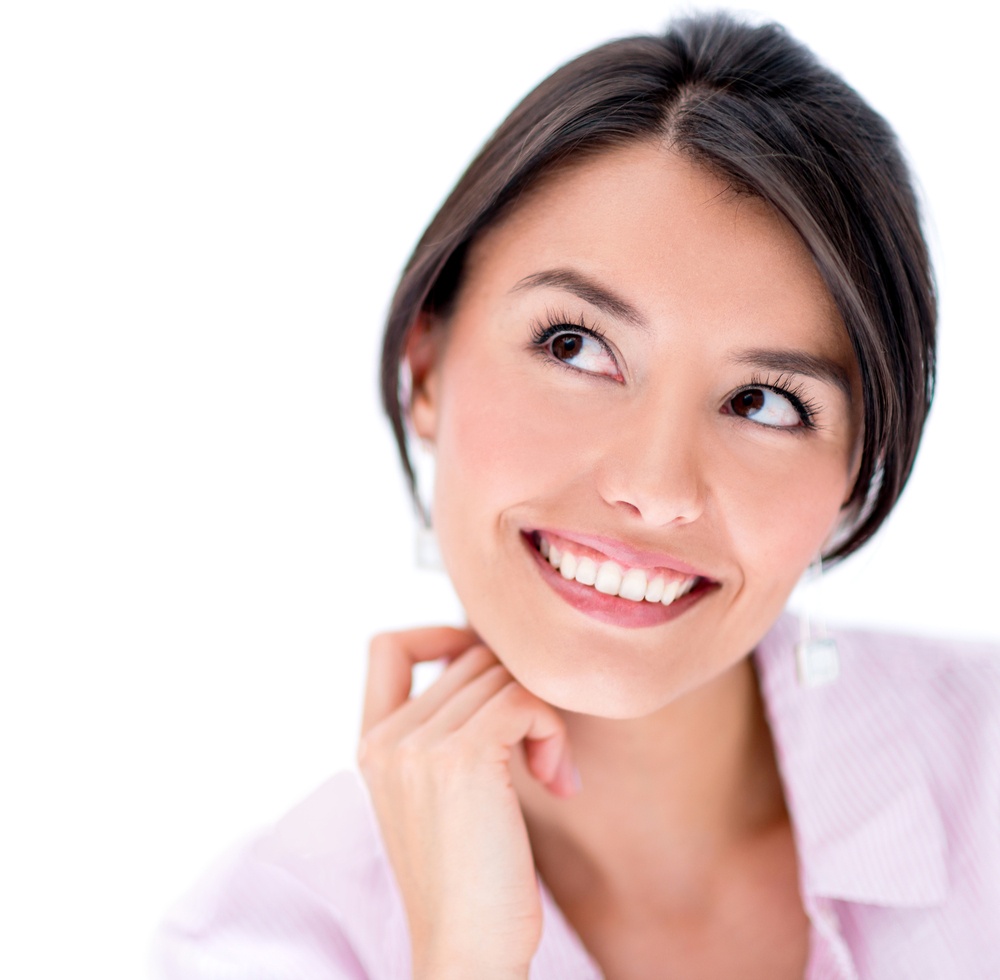 Portrait of a beautiful thoughtful woman smiling
